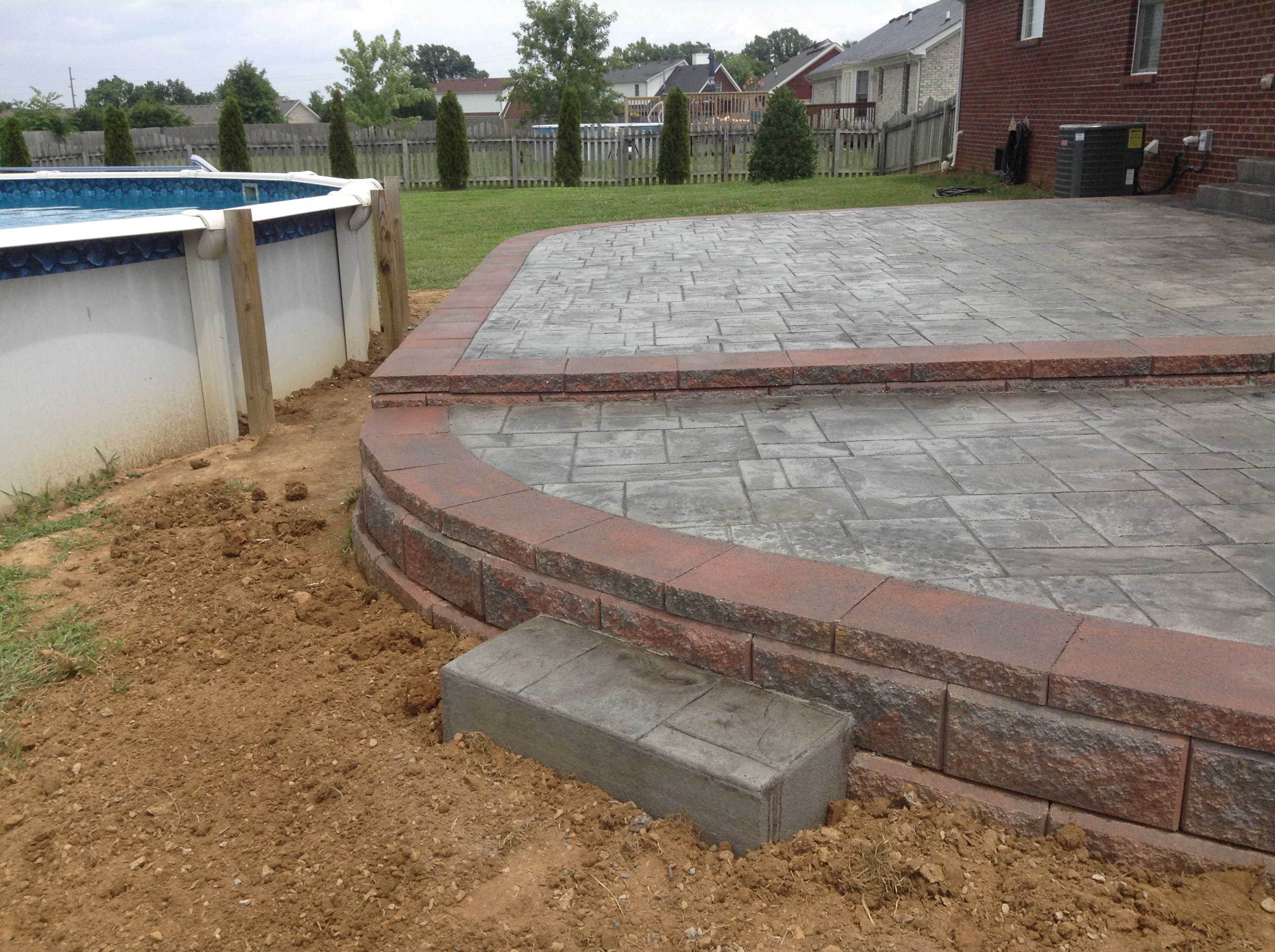 part 2 of wall with stamped patio